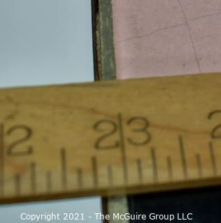 Vintage Wrought Iron Table with Pink and Black Tile Insert. Measures 15" tall and 23" square.