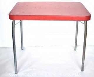 Mid Century Red Metal Table with Chrome Legs Made by Cosco. 24" x 30" x 34". *