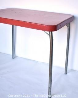 Mid Century Red Metal Table with Chrome Legs Made by Cosco. 24" x 30" x 34". *