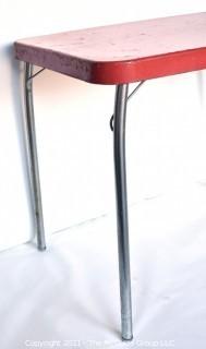 Mid Century Red Metal Table with Chrome Legs Made by Cosco. 24" x 30" x 34". *