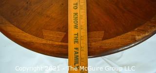 Vintage Mid Century Modern Lane Acclaim Drum Table Designed by Andre Bus with Cabinet in Base. Measures 27″D x 21″T.