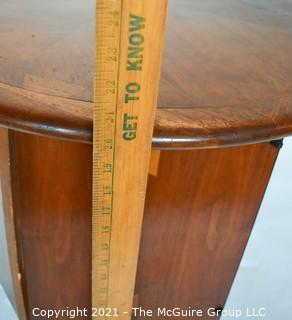 Vintage Mid Century Modern Lane Acclaim Drum Table Designed by Andre Bus with Cabinet in Base. Measures 27″D x 21″T.