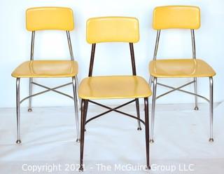 Three (3) Mid Century Modern Heywood Wakefield Woodite Solid Plastic Yellow and Chrome School Chairs. 