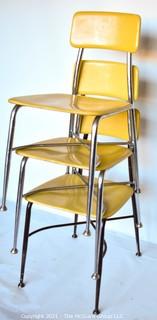 Three (3) Mid Century Modern Heywood Wakefield Woodite Solid Plastic Yellow and Chrome School Chairs. 