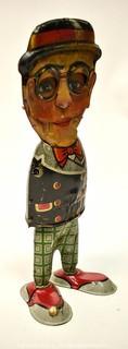 Vintage Harold Lloyd - Louis Marx Walkie Wind Up Tin Toy. Measures 10 1/2" tall. * Missing arms.  
