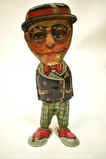 Vintage Harold Lloyd - Louis Marx Walkie Wind Up Tin Toy. Measures 10 1/2" tall. * Missing arms.  
