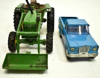 Two (2) Vintage Metal Toy Trucks Including John Deere and Tonka. 