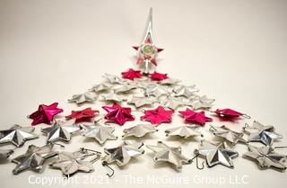 Collection of Vintage Pink & Silver Foil Puffy Star Christmas Ornaments and Plastic Tree Topper. 