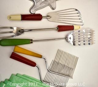 Group of Mid Century Kitchen Items Including Bakelite Handled Utensils, Deco Style Toothpick Dispenser, Atomic Salt & Pepper Shakers and Light Switch Wall Plate. 