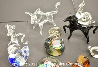 A Glass Menagerie of Hand Blown Animal Figurines and Paper Weights.