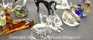 A Glass Menagerie of Hand Blown Animal Figurines and Paper Weights.