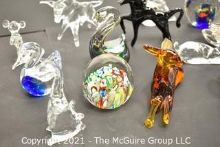 A Glass Menagerie of Hand Blown Animal Figurines and Paper Weights.