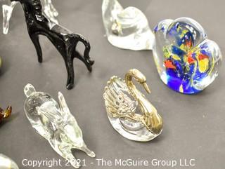 A Glass Menagerie of Hand Blown Animal Figurines and Paper Weights.