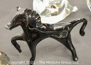 A Glass Menagerie of Hand Blown Animal Figurines and Paper Weights.