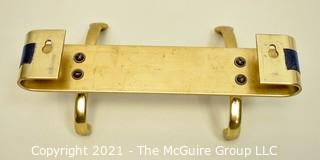 Two Hook Brass Wall Mount Coat Rack.