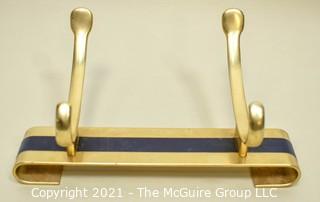 Two Hook Brass Wall Mount Coat Rack.