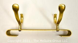 Two Hook Brass Wall Mount Coat Rack.