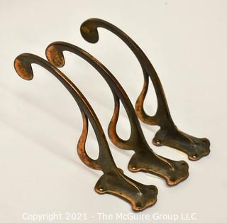 Group of Vintage Ornate Brass and Cast Iron Mission and Art Deco Style Wall Hooks. *