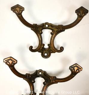 Group of Vintage Ornate Brass and Cast Iron Mission and Art Deco Style Wall Hooks. *