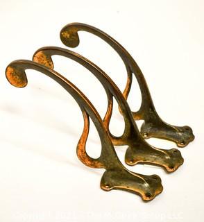 Group of Vintage Ornate Brass and Cast Iron Mission and Art Deco Style Wall Hooks. *