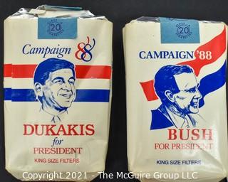 Collection of Political Buttons and Two Single Packs of Dukakis & Bush Cigarettes from 1988 U.S. Presidential Campaign. *