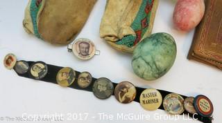 Collection including Native American moccasins, punched leather purses, marble eggs, White House invitation from Mrs. Woodrow Wilson and assorted vintage political buttons  