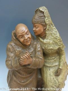 Painted fired clay statue: senora and padre; 12 1/2W x 15 1/2"T x 7 1/2"D 