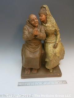 Painted fired clay statue: senora and padre; 12 1/2W x 15 1/2"T x 7 1/2"D 