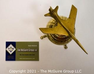 Decorative Brass World Globe with Airplane Attached.  Measures 10" tall. 