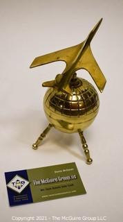 Decorative Brass World Globe with Airplane Attached.  Measures 10" tall. 