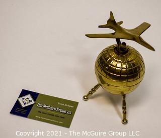 Decorative Brass World Globe with Airplane Attached.  Measures 10" tall. 