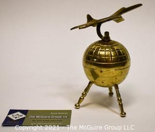 Decorative Brass World Globe with Airplane Attached.  Measures 10" tall. 