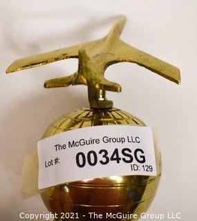 Decorative Brass World Globe with Airplane Attached.  Measures 10" tall. 