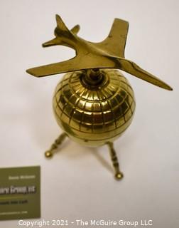 Decorative Brass World Globe with Airplane Attached.  Measures 10" tall. 