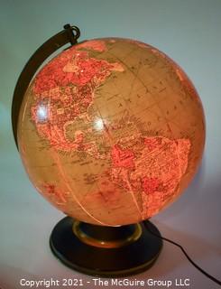 Vintage Illuminated World Globe Lamp and Stand.  Measures 14" tall.