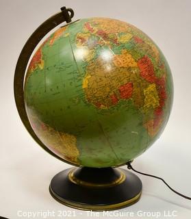 Vintage Illuminated World Globe Lamp and Stand.  Measures 14" tall.