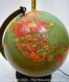 Vintage Illuminated World Globe Lamp and Stand.  Measures 14" tall.