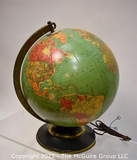 Vintage Illuminated World Globe Lamp and Stand.  Measures 14" tall.