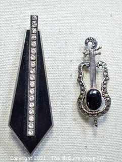 Two Sterling Silver and Marcasite or Rhinestone Brooches.