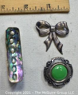 Three (3) Sterling Silver Brooches Including Bow, Abalone Shell and Green Stone. 