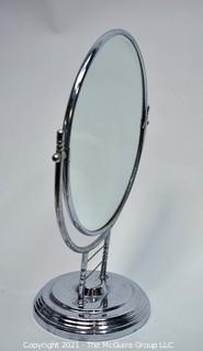 Art Deco Chrome Vanity Table Top Mirror.  Measures 13" in Diameter and 17" Tall.