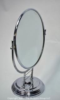 Art Deco Chrome Vanity Table Top Mirror.  Measures 13" in Diameter and 17" Tall.