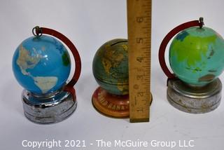 Three (3) Vintage Metal Litho Globe Banks on Stands.