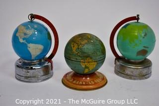 Three (3) Vintage Metal Litho Globe Banks on Stands.