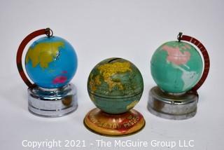 Three (3) Vintage Metal Litho Globe Banks on Stands.