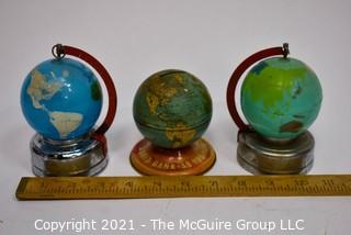 Three (3) Vintage Metal Litho Globe Banks on Stands.