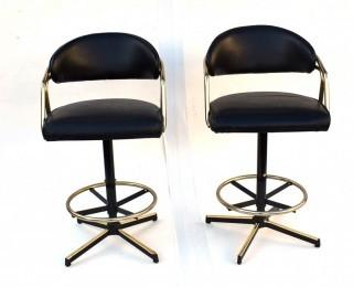 Pair of 1960's Sculptural Chrome and Black Vinyl Bar Stools