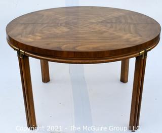 Vintage Walnut Campaign Style Dining Table From The Drexel Accolade Collection with One 20"W Leaf Extension.