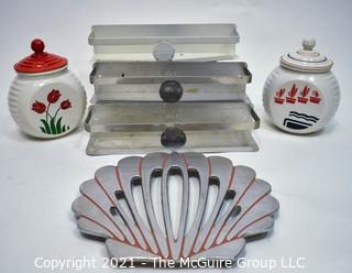 Group of Vintage Art Deco Style Kitchen Items Including Three Metal Maid of Honor Spice Rack Shelves, Scallop Shaped Trivet and Two Milk Glass with Painted Details Canister Jars. 