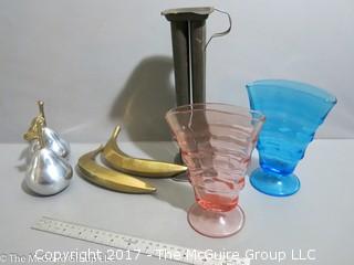 Collection including candle mold, depression glass vases, and decorative fruit